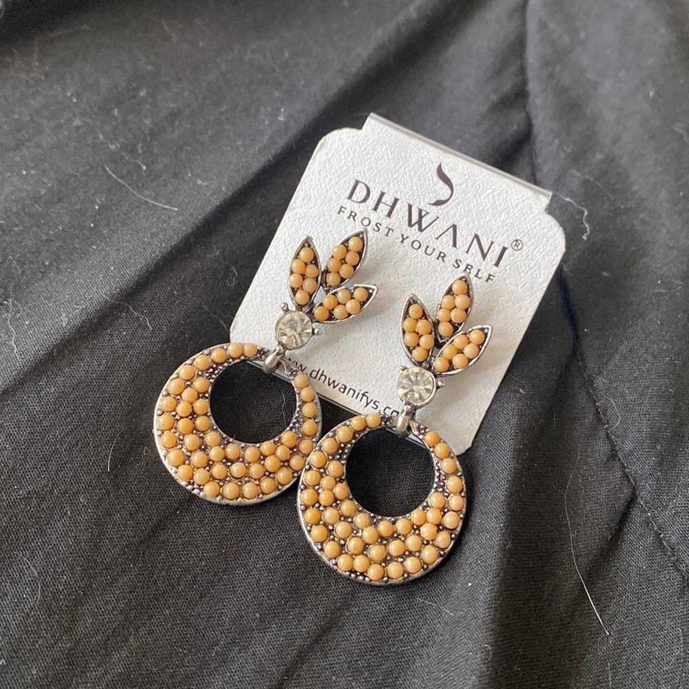 Tan beaded post earrings. NWT